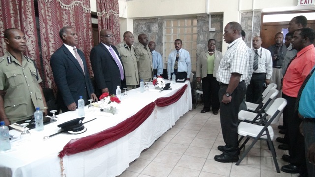 (L-R) Assistant Commissioner of Police Vaughn Henderson, Premier of Nevis and Minister of Security Hon. Vance Amory, Prime Minister of St. Kitts and Nevis and Minister of National Security Dr. the Hon. Timothy Harris, Commissioner of Police Stafford Liburd, Inspector Stephen Hector, Permanent Secretary in the Premier’s Ministry Wakely Daniel, Permanent Secretary in the Prime Minister’s Office Osbert De Souza and Superintendent Mercelyn Hughes at a meeting at the Charlestown Police Station on October 14, 2015